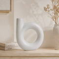 Amira Single Vessel Vase in white ceramic with bold curved sculptural silhouette
