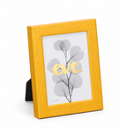 Gelati Yellow by Eve photo frame in bright yellow high-gloss resin with softly rounded raised edges