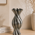 Gustel Twist Pine Vase in pine glazed ceramic with twisted ribbed silhouette