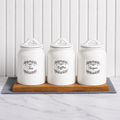 Country Cottage Canister Set in white ceramic with vintage-style detailing, cylindrical canisters